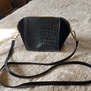 Stunning little black purse small. In excellent condition.